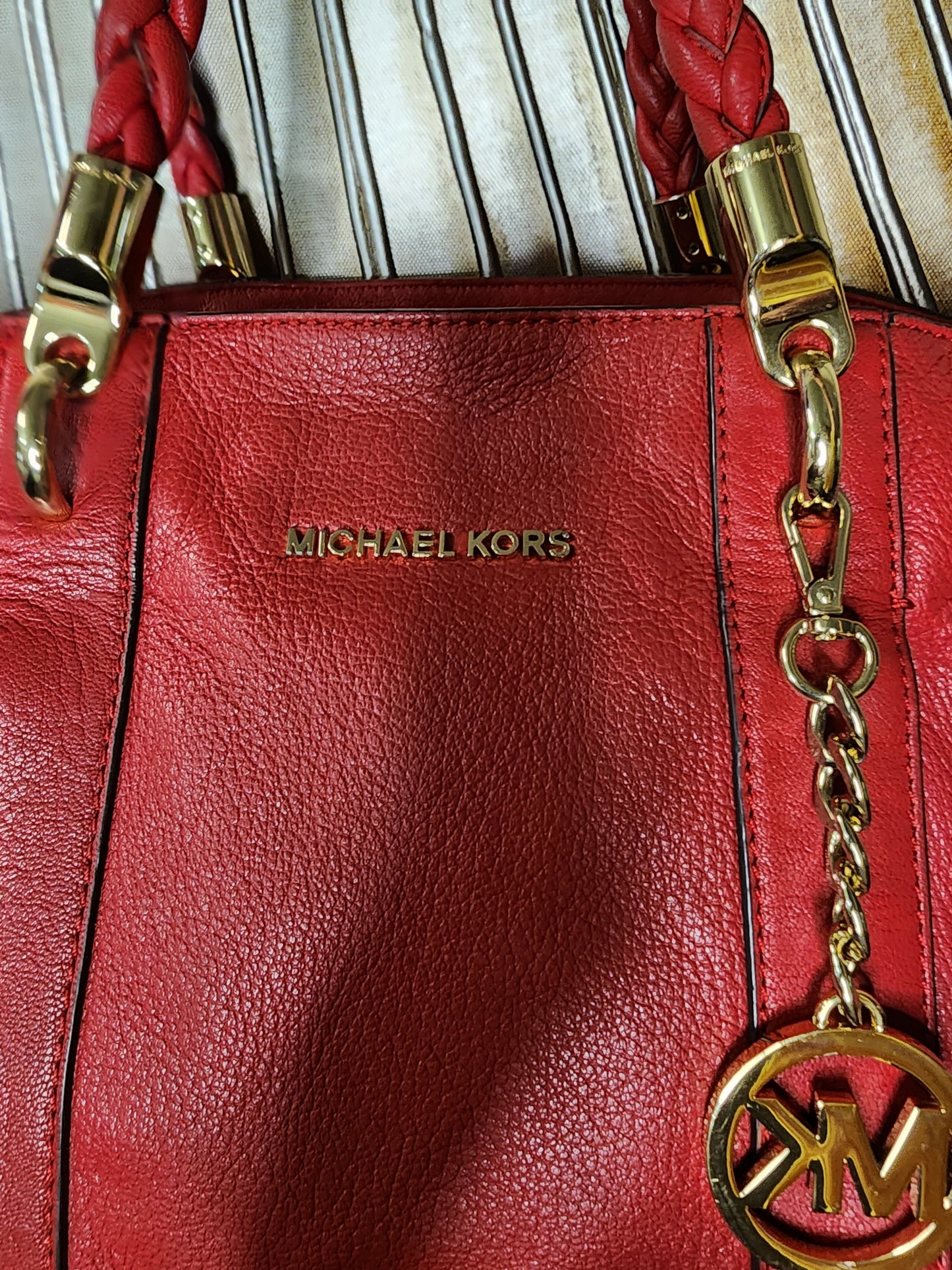 Michael Kors Red Handbag with Braided Straps and Gold Hardware
